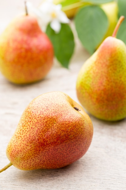 Fresh bio pears on a bright background