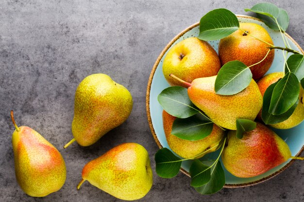 Fresh bio pears on a bright background