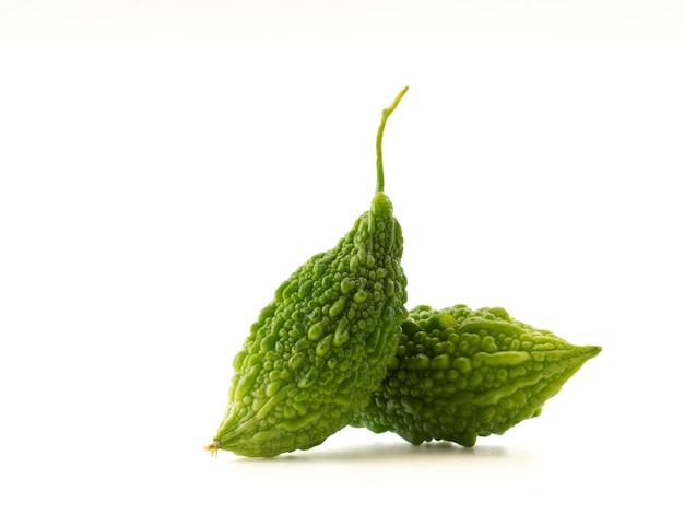 Fresh bitter gourd on white background.