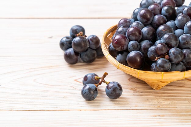 fresh black grapes isolated