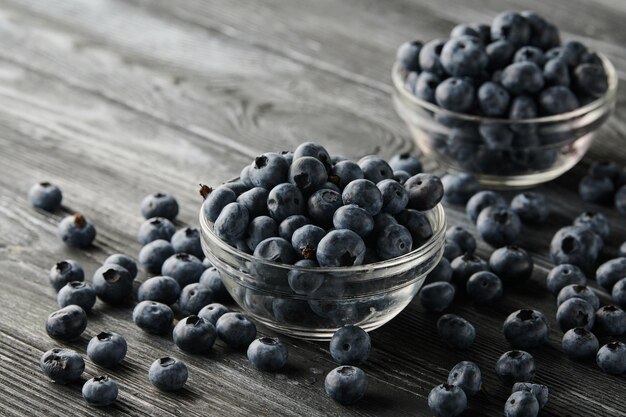 Fresh blueberries in bowls on the table