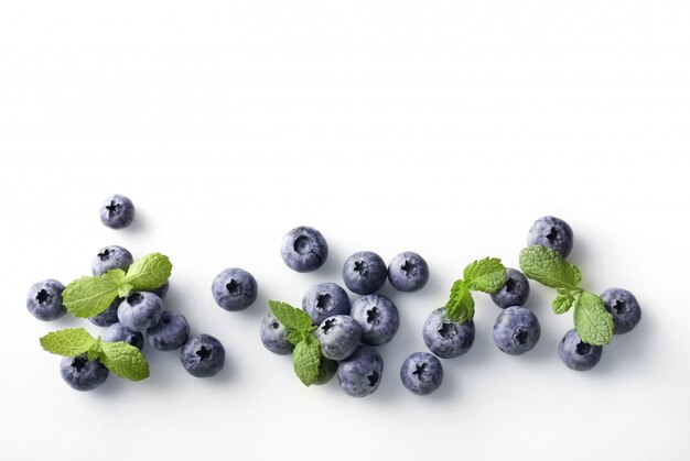 Fresh blueberries isolated on white . Top view