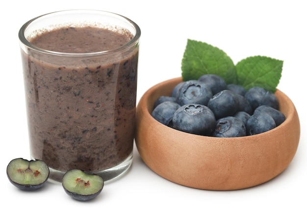 Fresh blueberries and juice in a glass