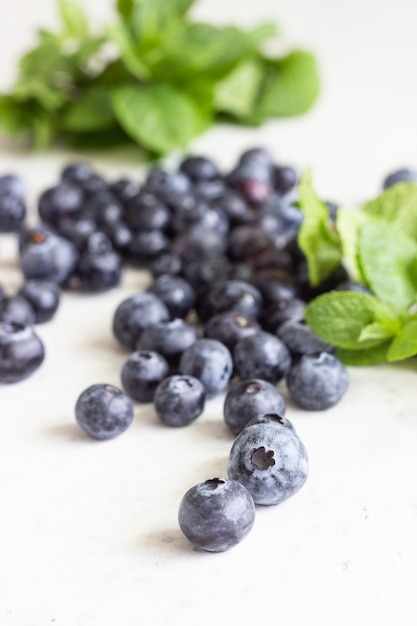 Fresh blueberries and mint leaves