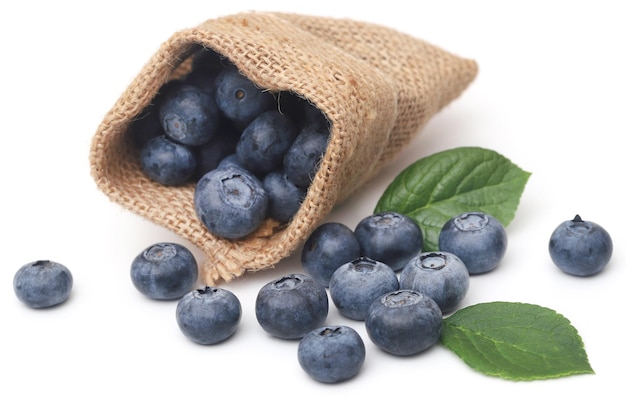 Fresh blueberries over white background