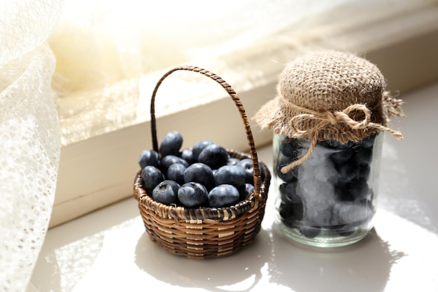 Fresh blueberries on window sill