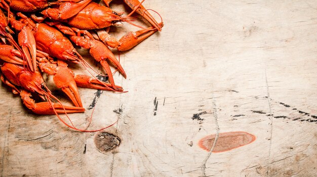 Fresh boiled crawfish. On a Wooden table.