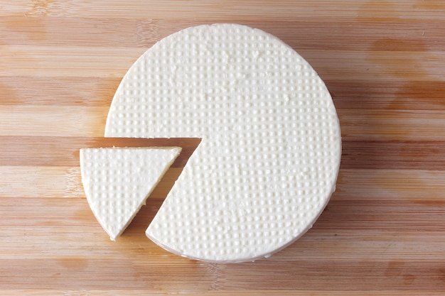 Fresh Brazilian white minas cheese on a plate