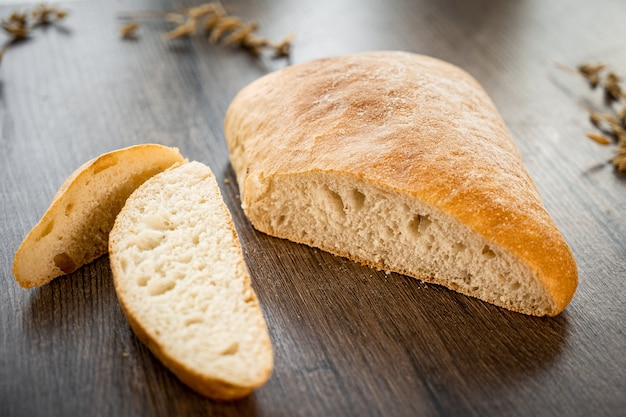 Fresh bread bakery on wooden table