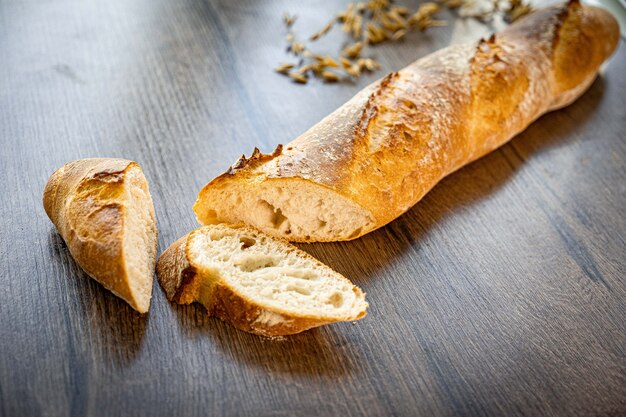 Fresh bread bakery on wooden table