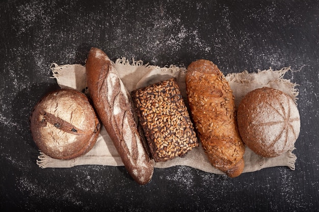 Fresh bread on dark board