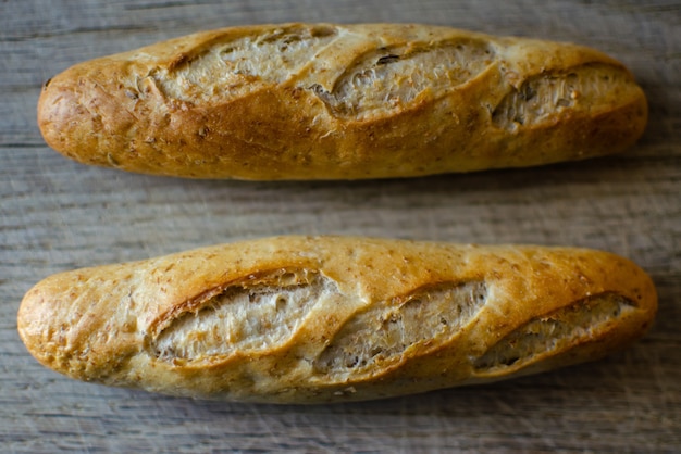 Fresh bread on oak cutting board