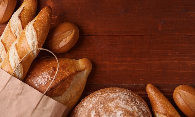 Fresh bread in a paper bag. small bakery concept with gluten free flavored bread