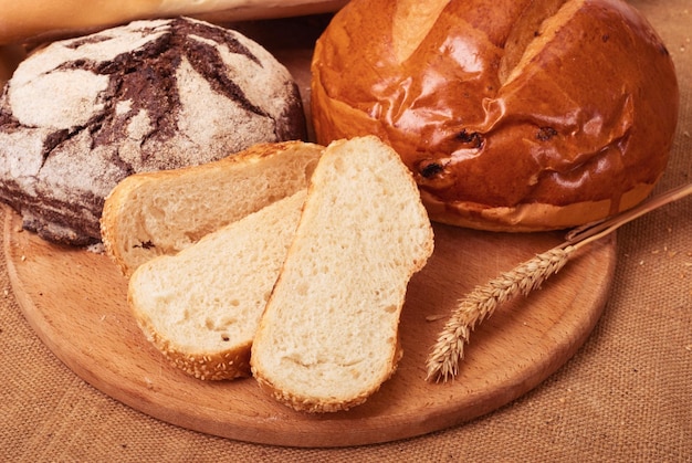 fresh bread and wheat on the burlap