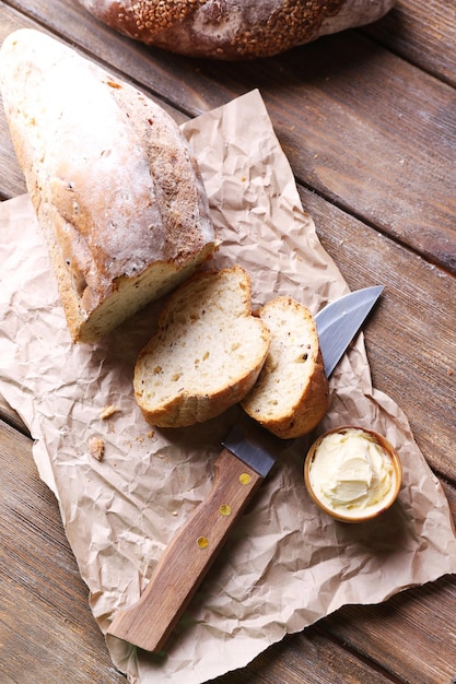 Fresh bread on wooden background