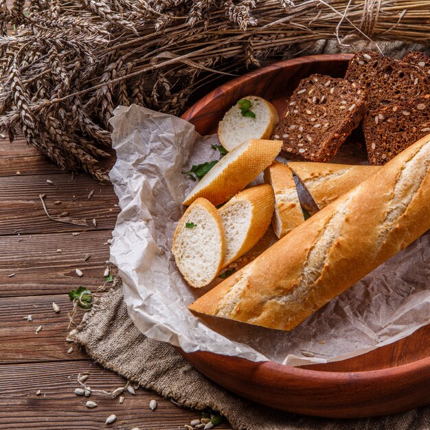 Fresh bread in wooden dish