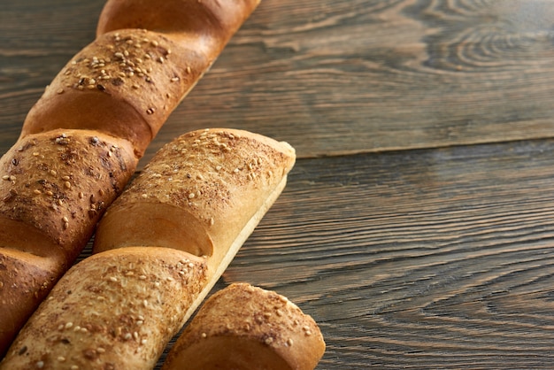 Fresh bread on wooden worktop