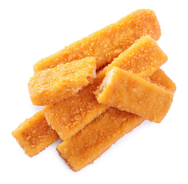 Fresh breaded fish fingers on white background top view