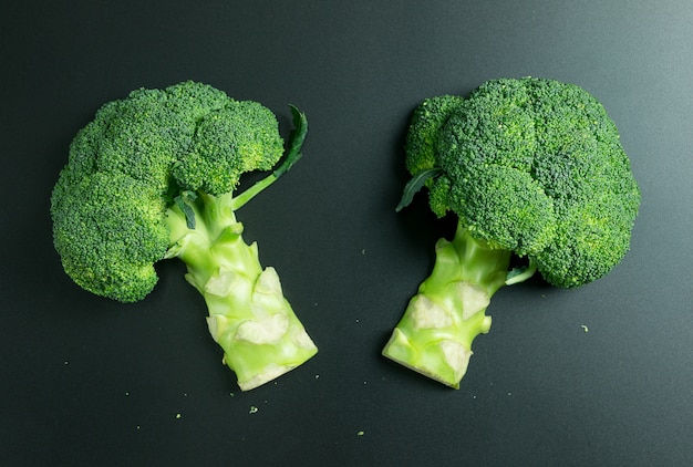 Fresh broccoli on black background