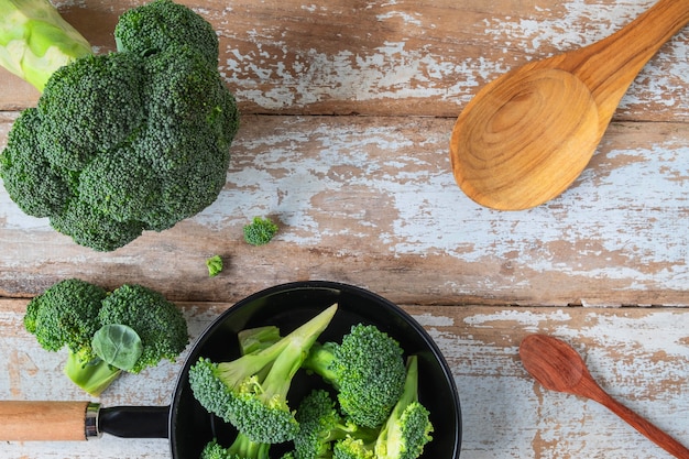 Fresh Broccoli for Cooking on Kitchen Table