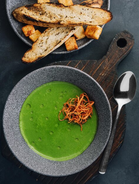 Fresh broccoli cream soup in bowl