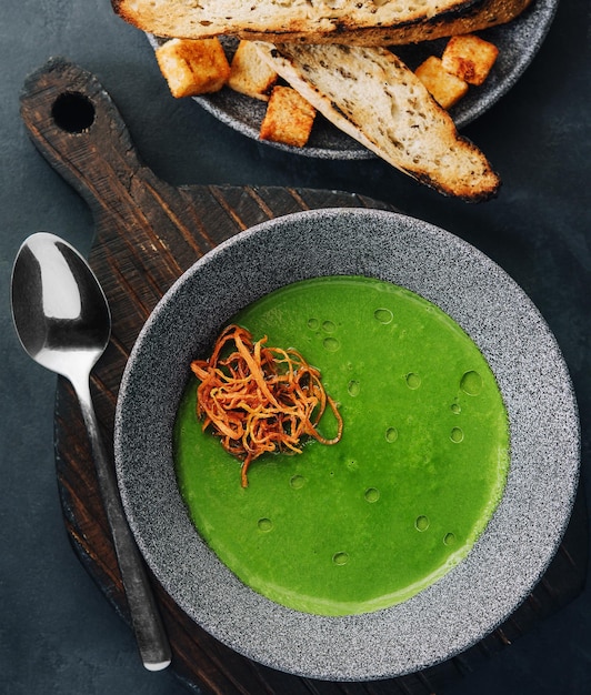 Fresh broccoli cream soup in bowl