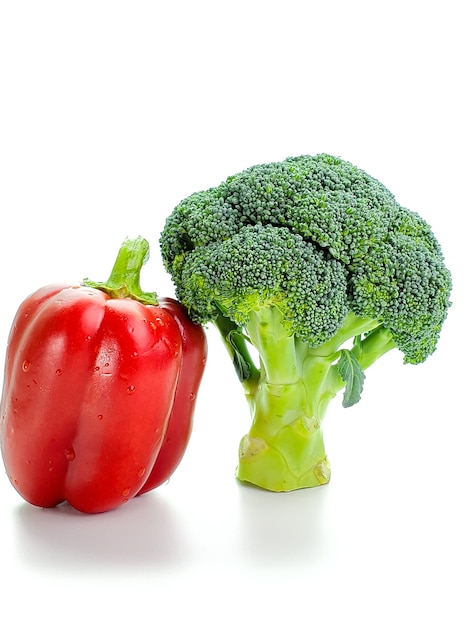 Fresh broccoli and pepper isolated on white