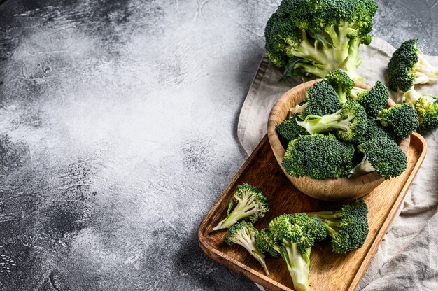 Fresh broccoli in a wooden bowl. 