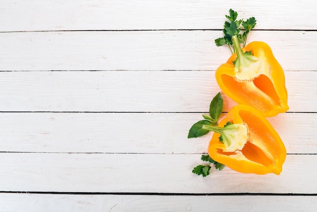 Fresh Bulgarian pepper Paprika On a wooden background Top view Copy space