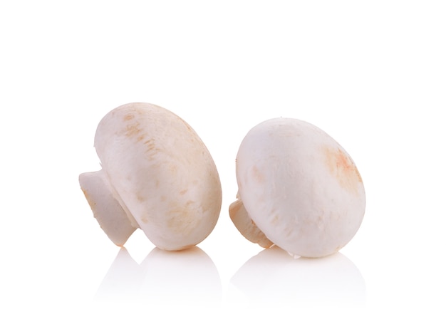 Fresh button mushrooms, champignons, on white