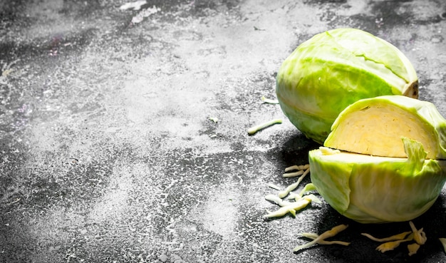 The fresh cabbage. On the rustic background.