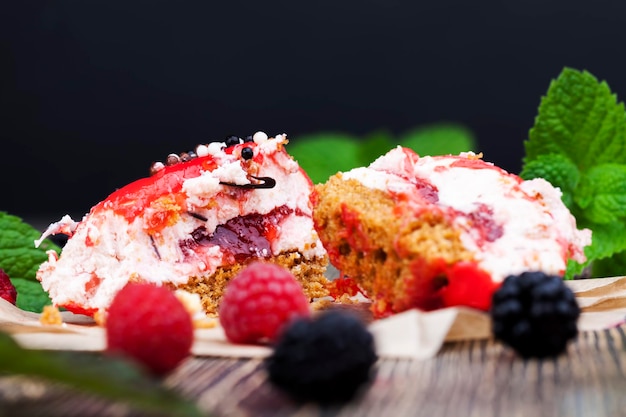 Fresh cake with red raspberry jam