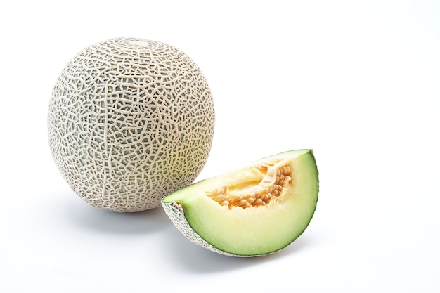 Fresh cantaloupe melon on the white background. Creative layout made of melon. Food concep