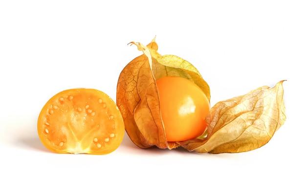 Fresh Cape gooseberry fruit on white surface