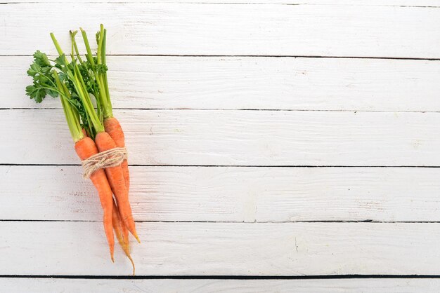 Fresh Carrot Fresh vegetables On a wooden background Top view Copy space