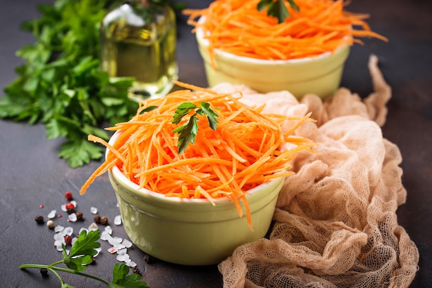 Fresh carrot salad on bowls