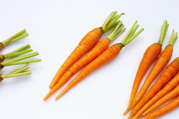 Fresh carrots on white background