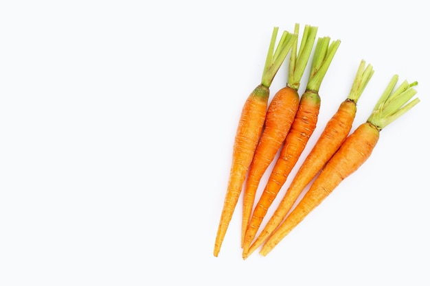 Fresh carrots on white background