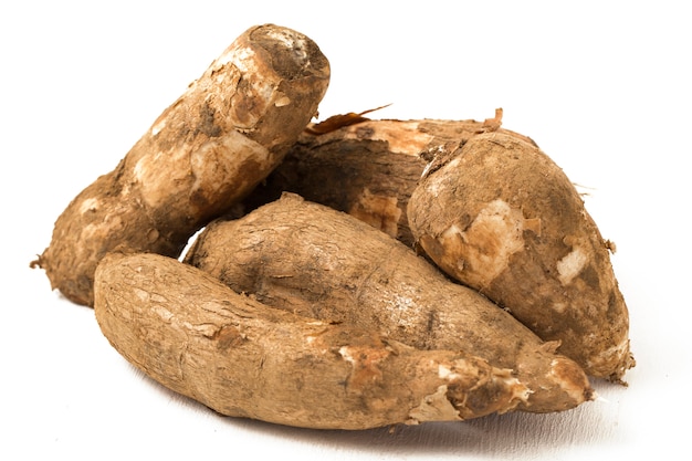 Fresh Cassava root isolated closeup