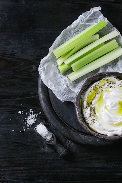 Fresh celery with yogurt dip