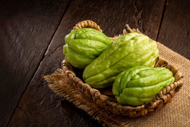 Fresh chayote fruits on the table