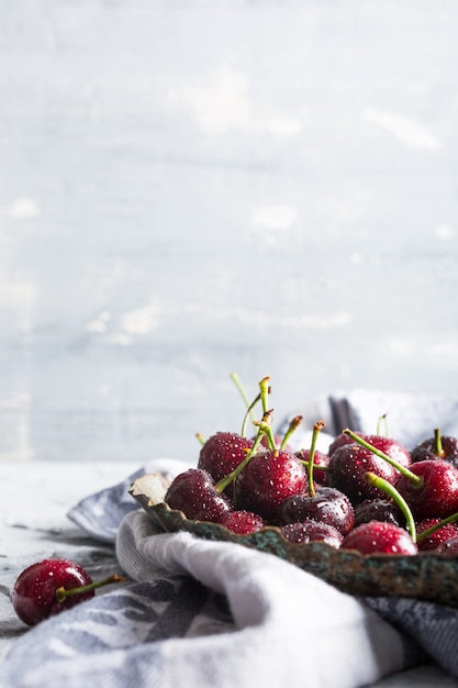 Fresh cherries with water drops.