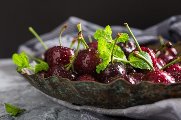 Fresh cherries with water drops.