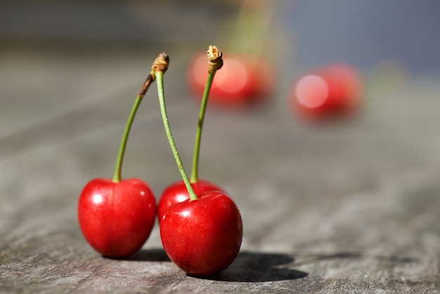 Fresh cherries on wooden table