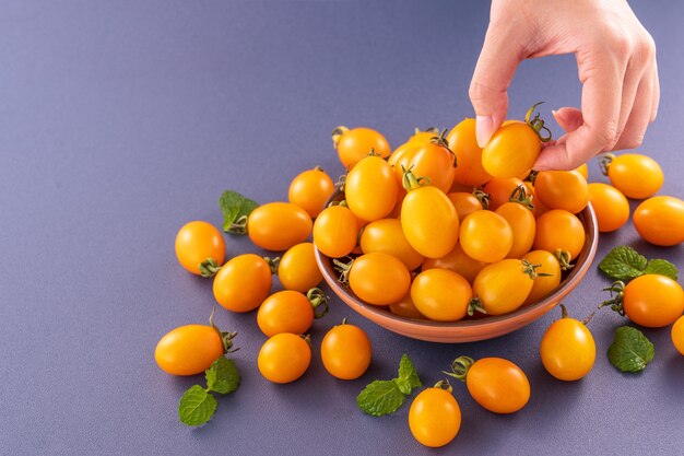 Fresh cherry tomatoes in bowl