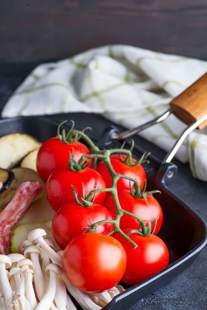 Fresh cherry tomatoes grill pan