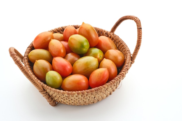 Fresh cherry tomatoes on white background Close up selected focus