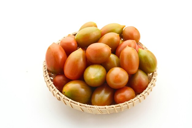 Fresh cherry tomatoes on white background Close up selected focus