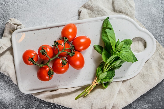 Fresh cherry tomatoes on white