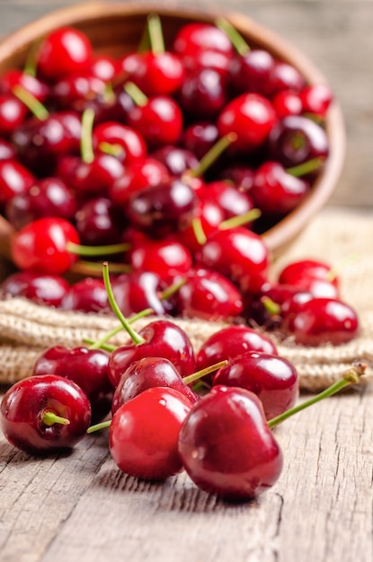 Fresh cherry on wooden table.